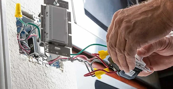 Residential electrician working on a panel upgrade in Bowie, MD.